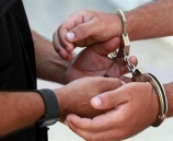 الشرطة تقبض على تاجر مخدرات وتضبط مواد يشتبه أنها مخدرة في جنين