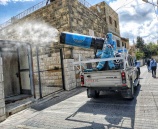 الشرطة تنظم حملة تعقيم في قرى ضواحي القدس