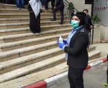 الشرطة تقدم التوعية حول الإجراءات الوقائية من فيروس كورونا في نابلس 