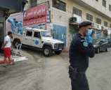الشرطة تنظم حملة تعقيم في مخيم الجلزون في رام الله