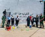الشرطة تشارك برسم جدارية  وطنية في قلقيلية