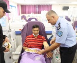 الشرطة تنظم جولة معايدة للمرضى في عيد الأضحى المبارك في رام الله