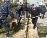 الشرطة والامن الوطني ينظمان يوم عمل تطوعي في بلدة بيت فوريك شرق نابلس .
