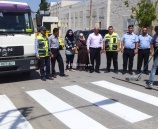 الشرطة تشارك بإعادة تأهيل متطلبات السلامة المرورية أمام مدرسة فاطمة الزهراء في طولكرم