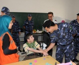 الشرطة الخاصة تزور مخيم دمج المعاقين في رام الله