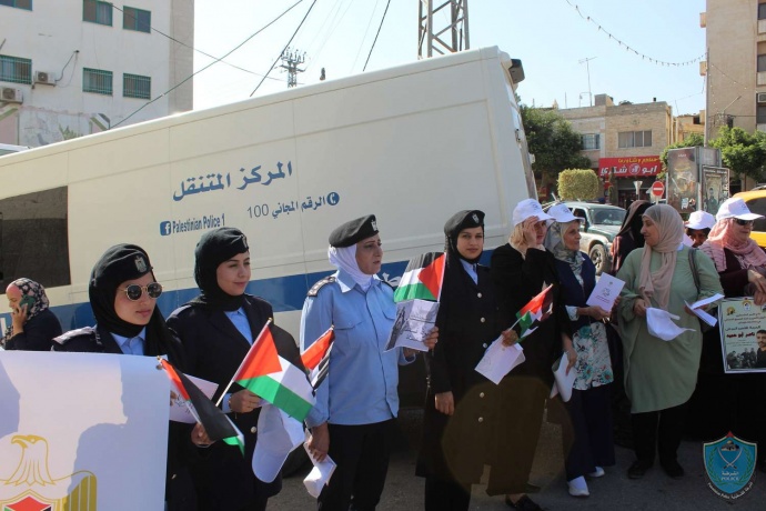 الشرطة تشارك في وقفة تضامنية بمناسبة اليوم الوطني للمرأة الفلسطينية